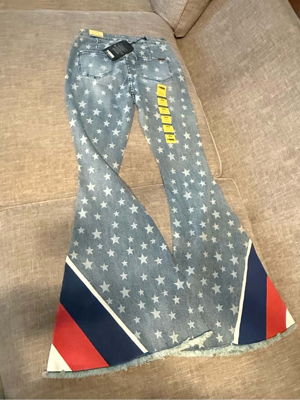 Star-Print Flared Jeans with Red & Navy Hem Accent